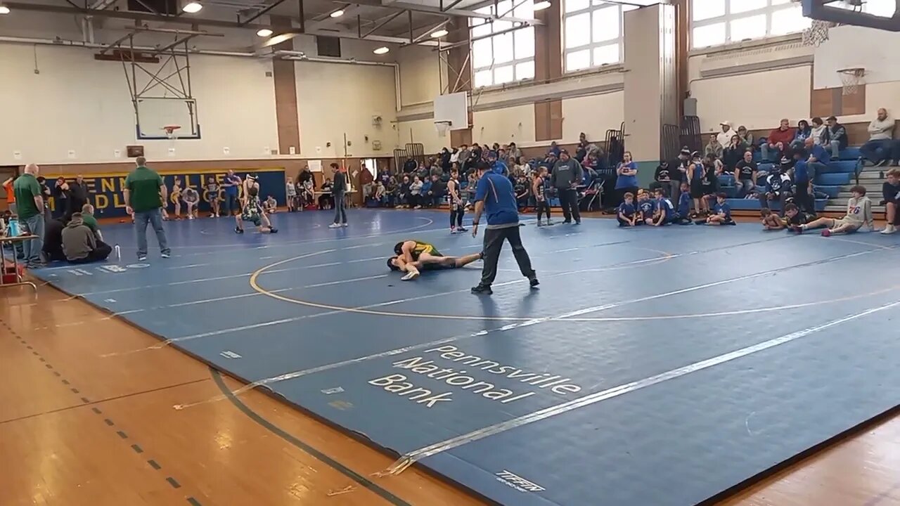 My 14 Year Old Grandson Taking The Mat ( Wearing Green and Yellow)