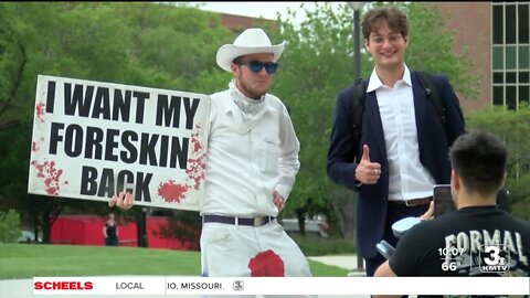 'Blood-stained' protestors in Lincoln call for an end to circumcision