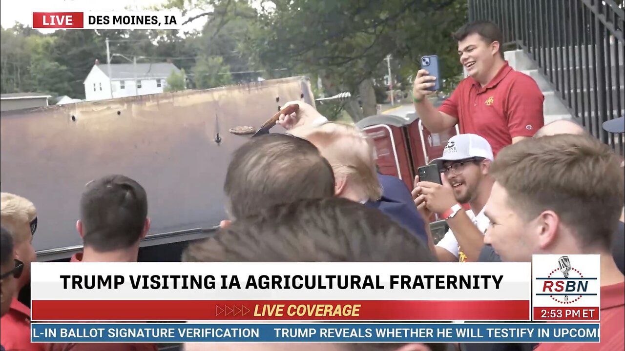 President Donald J. Trump flips the burger for the Iowa v. Iowa State Football Game