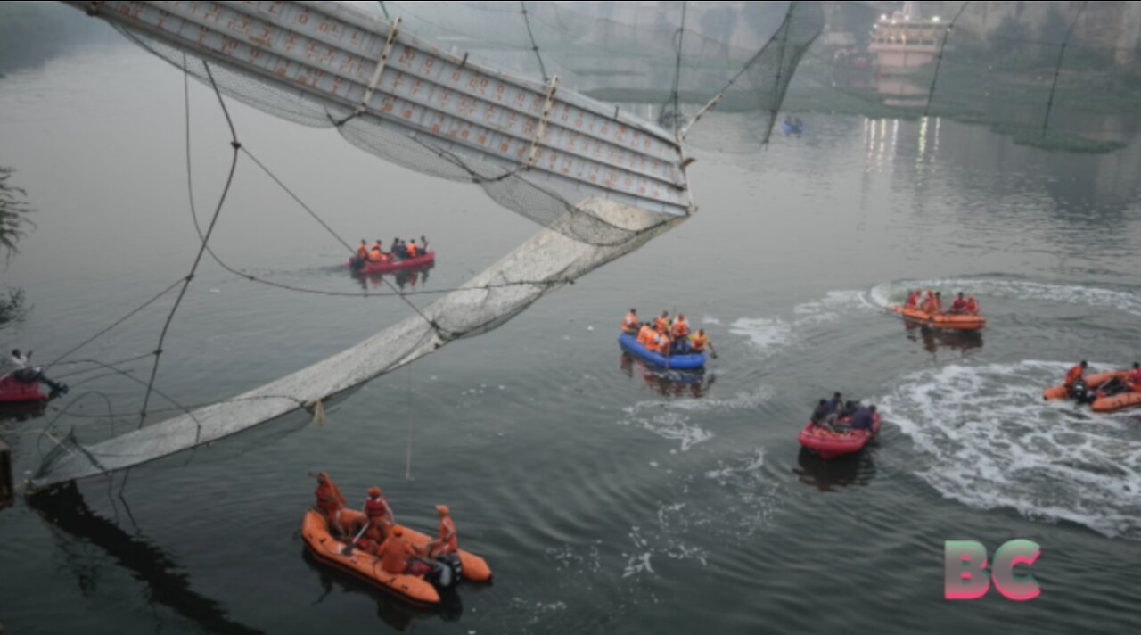 Pedestrian bridge collapses in India, killing at least 132