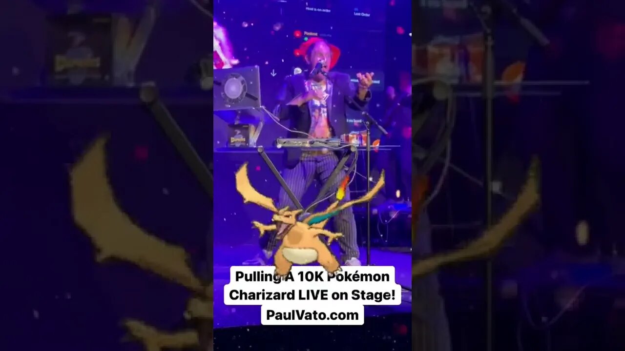 A 10K Pokémon Charizard Is Hit LIVE On Stage By Pokémon Theme Song Singer, Jason Paige!