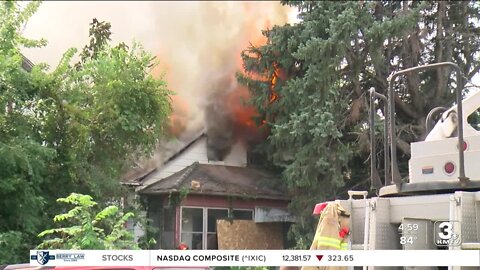 Omaha Fire Department battles two house fires at 20th and Ohio on Monday