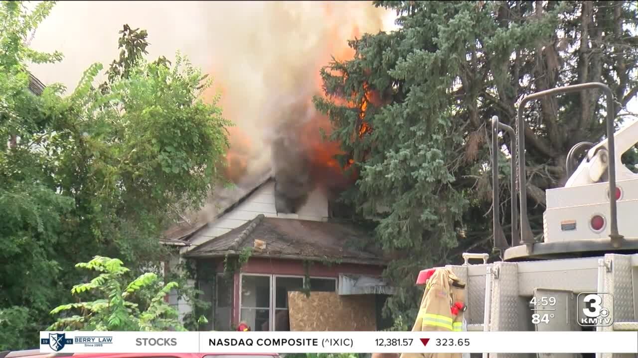 Omaha Fire Department battles two house fires at 20th and Ohio on Monday