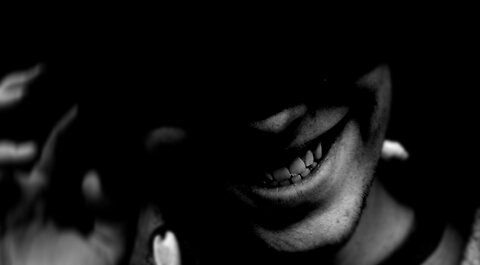 Grinning-Man on Scary Flight says it's OK