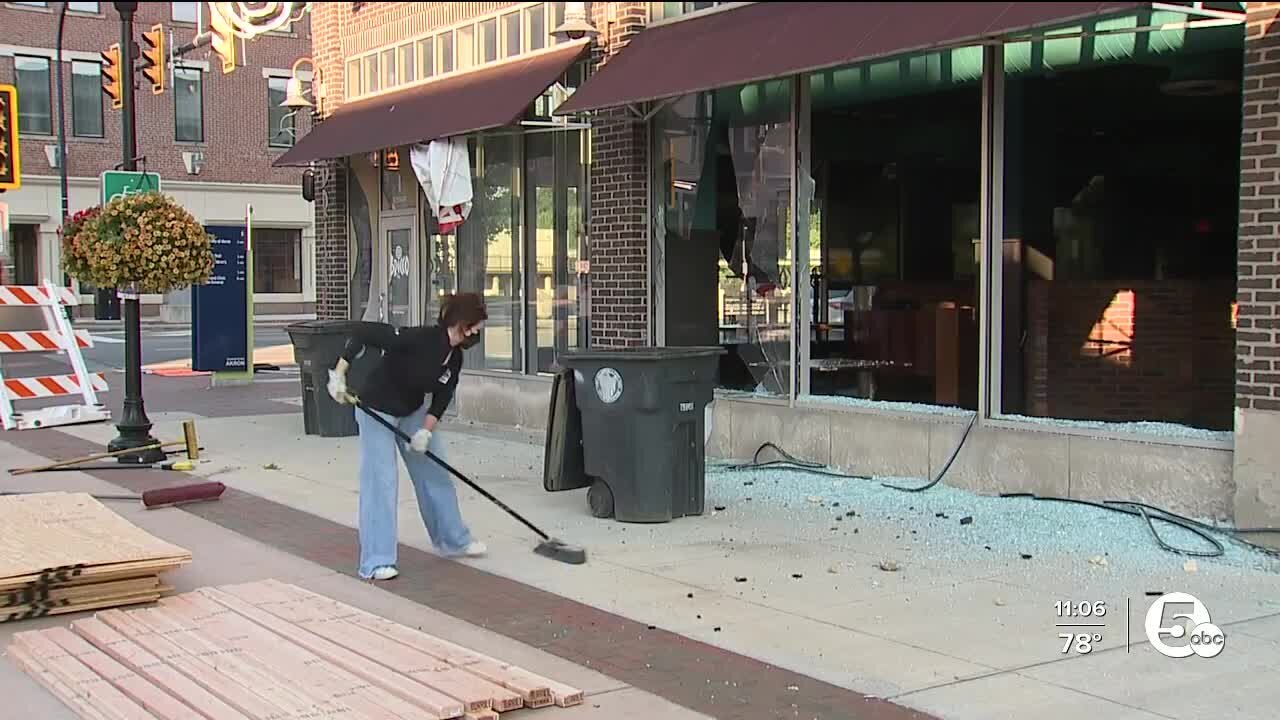 Curfew issued after windows broken at several downtown Akron businesses; about 50 people arrested, police say