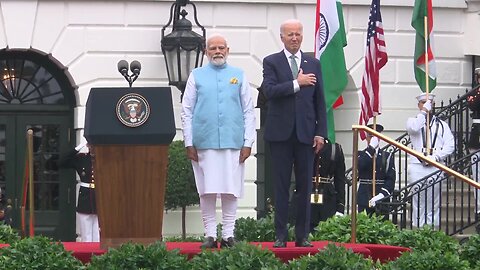 Joe Biden slowly lowers hand after realizing National Anthem isn't playing + Modi