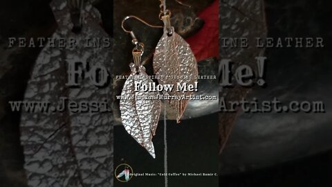 SILVER SHOWDOWN, 1 inch leather feather earrings