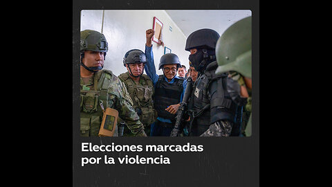 Candidatos presidenciales ecuatorianos votan con chalecos antibalas