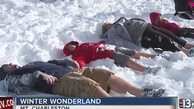 Families have fun in snow on Mount Charleston