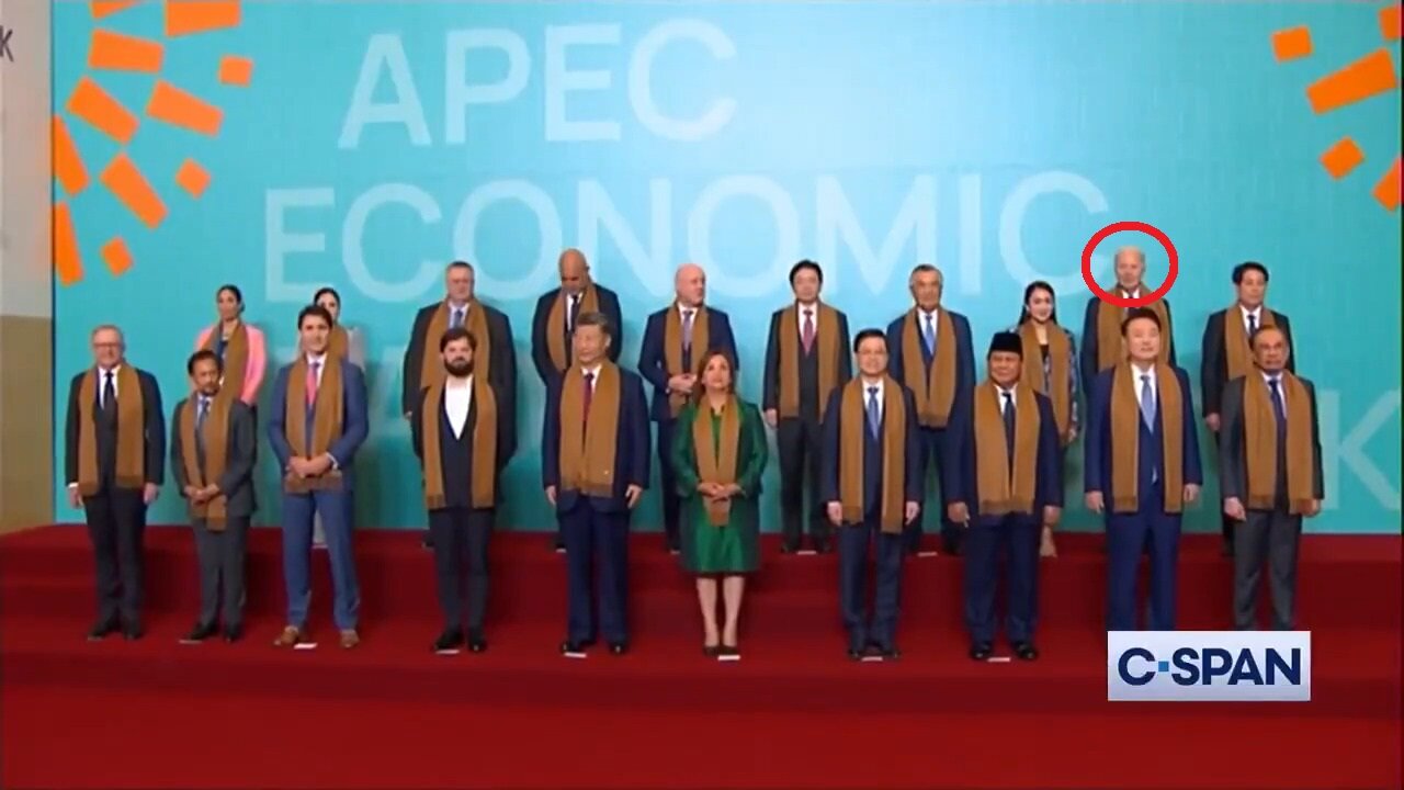 Lame Duck President Joe Biden Stuck In The Back Of APEC Family Photo