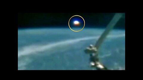 ISS camera captures a gigantic UFO next to Earth during one of its live broadcasts
