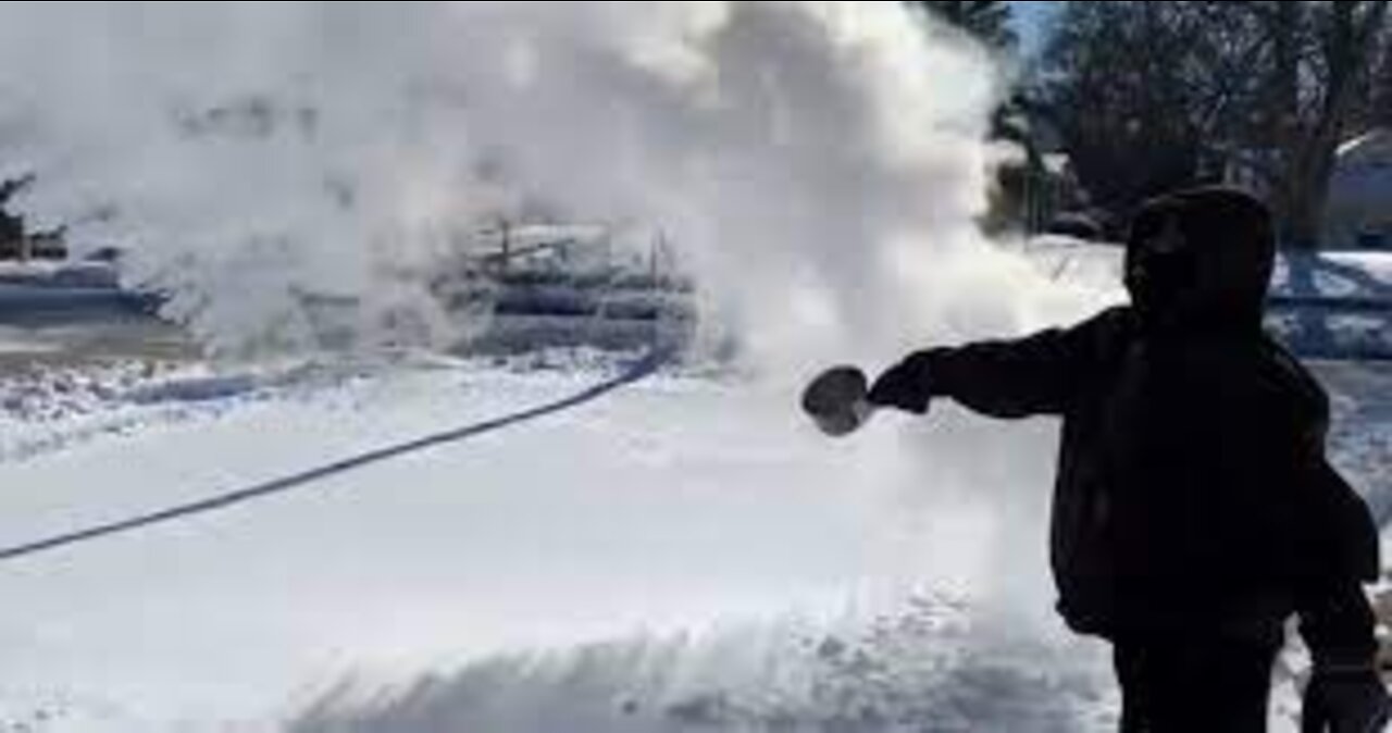 Throwing boiling hot water into freezing air.