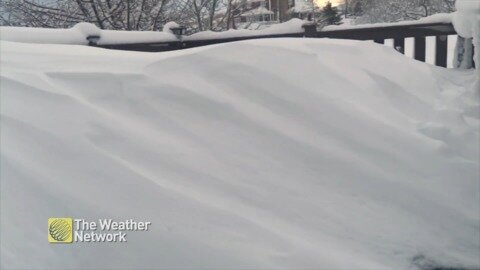 Snow drifts as tall as the banister, looks like we're shovelling again...