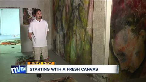 Artist opens gallery in building he tried to rob