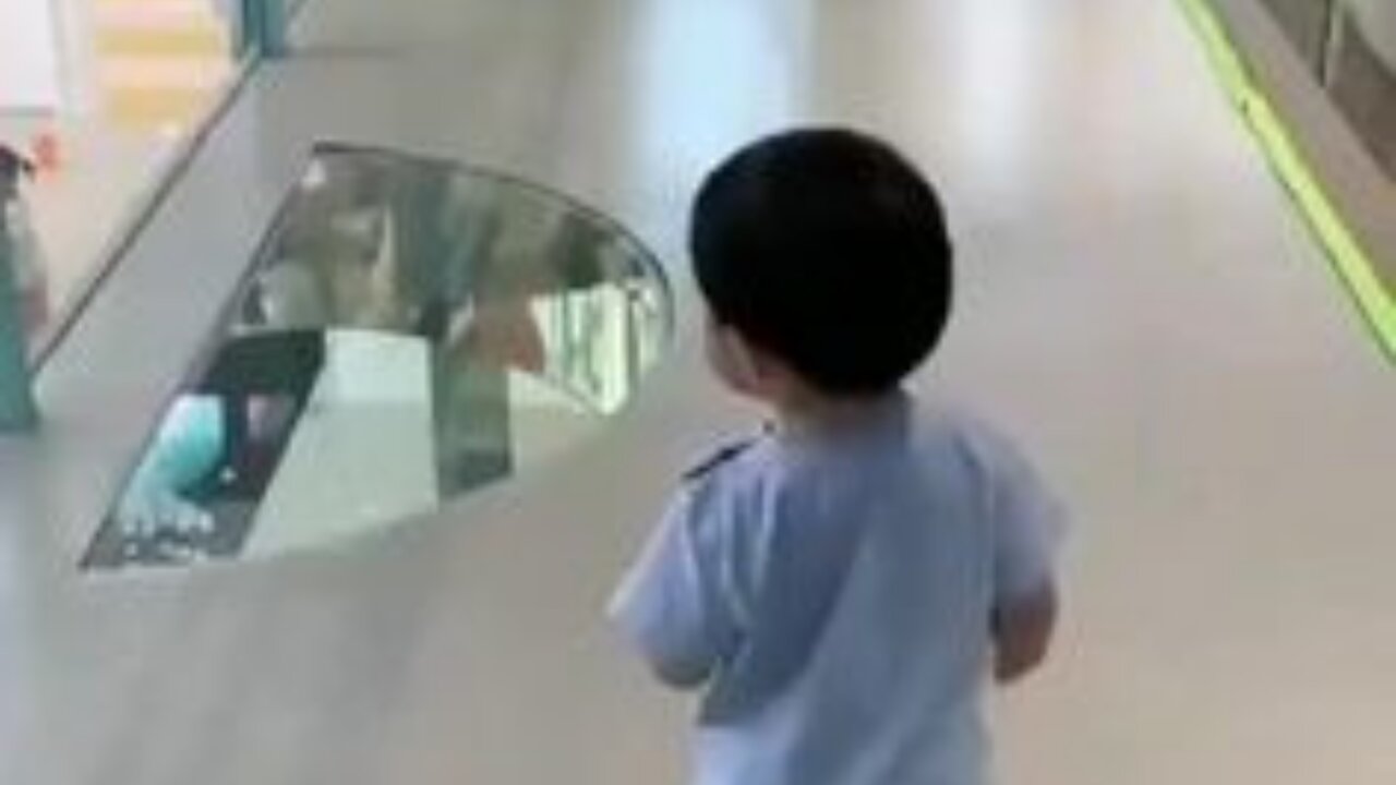 Funny Baby walking on mirror