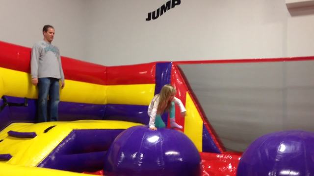 Hilarious Dad Fails Gloriously At Bouncy Obstacle Course