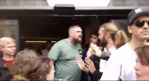 Vegan protestors vs. hungry carnivore man