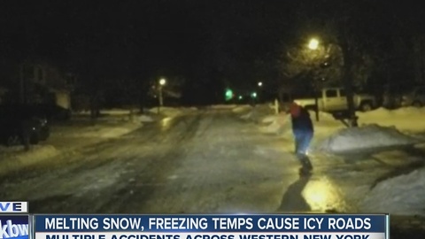 Residential streets covered in slick sheets of ice