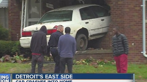 Car crashes into home