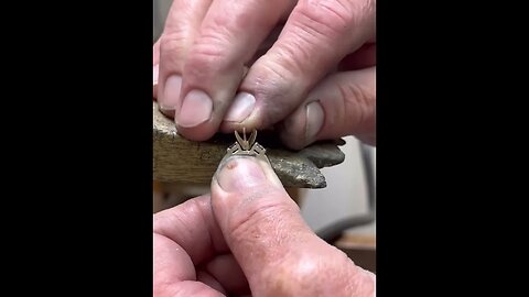 Setting a new head in a ring and freshening up prongs on a matching band