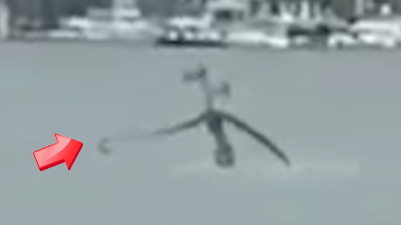 Mysterious figure with long arms and legs seen walking in the ocean! real or fake [Space]