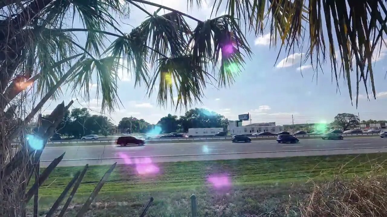 Butterfly Effect over I-4 at The Rosen Inn at Pointe Orlando - Late Afternoon traffic and sound