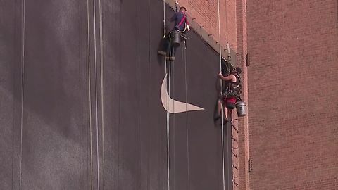 RAW: Crews begin taking down the LeBron banner