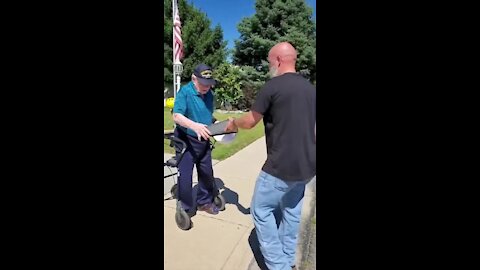 Veteran gives fellow veteran an encased flag for his 99th birthday