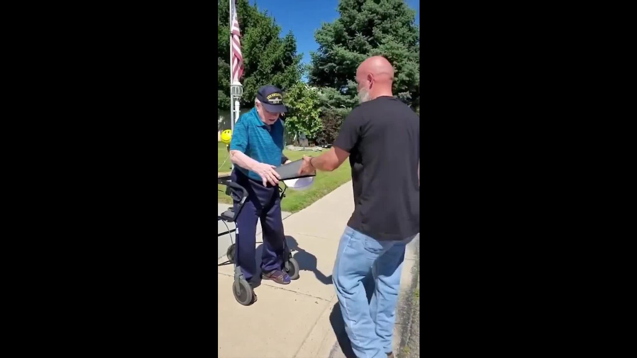 Veteran gives fellow veteran an encased flag for his 99th birthday