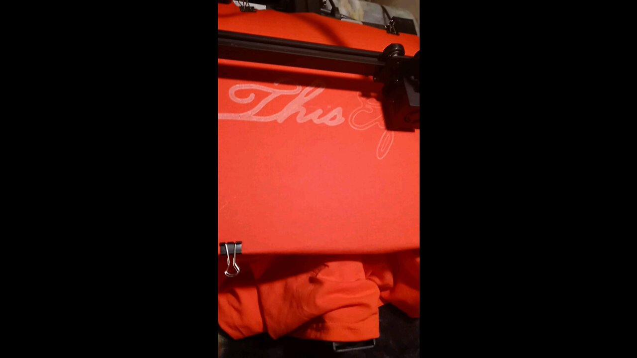 ThisElf 3d printed on an orange shirt