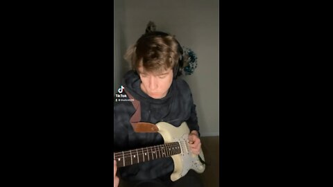 Playing guitar on a trap beat