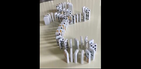 Dominoes Falling in Slow-Motion 2