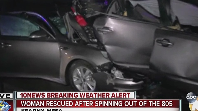 Woman rescued after spinning out of the 805