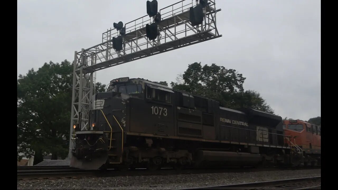 1073 the Penn Central & 2 BNSF's lead an intermodal