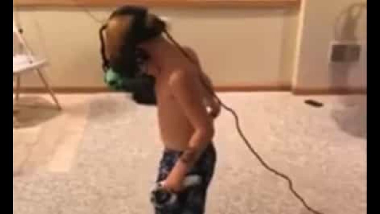 Kid hits the wall while playing VR game