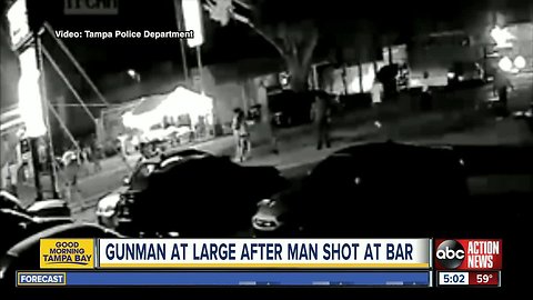 Police search for two men accused of shooting a Tampa father on a date with his wife