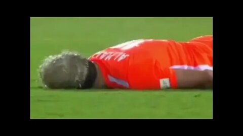 Soccer player drops to the ground complaining about his chest...