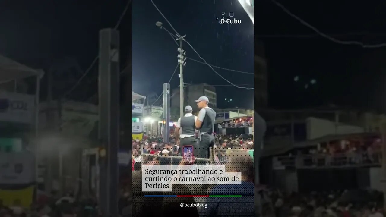 Segurança trabalhando e curtindo o carnaval ao som de Pericles