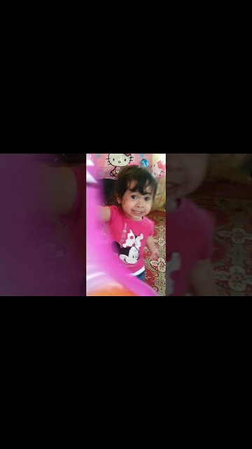 cute princess celebrates her second birthday and plays with baloons