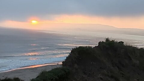 The Sun Burns Low through the fog.