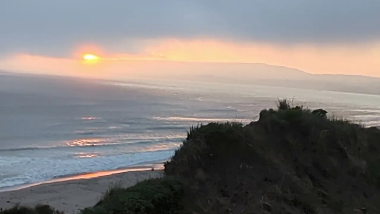 The Sun Burns Low through the fog.