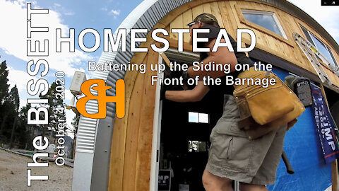 The Bissett Homestead Battening up the Siding on the Front of the Barnage