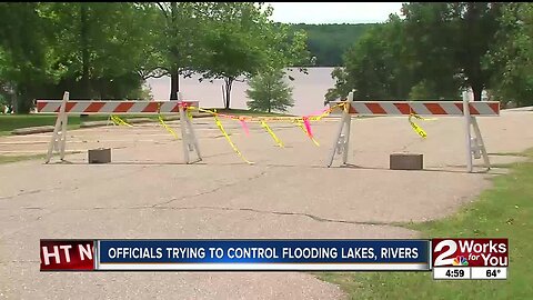 Officials trying to control flooding levels