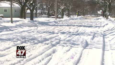 Not all neighborhood streets are clear of snow