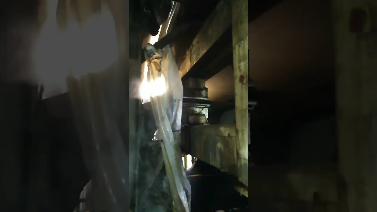 inside a paper recycling facility, the end where the cardstock comes out.