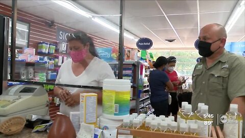 Husband and wife pharmacists vaccinate thousands at Lakeland pharmacy