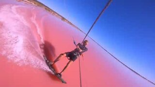 Kitesurfing on a pink lake!