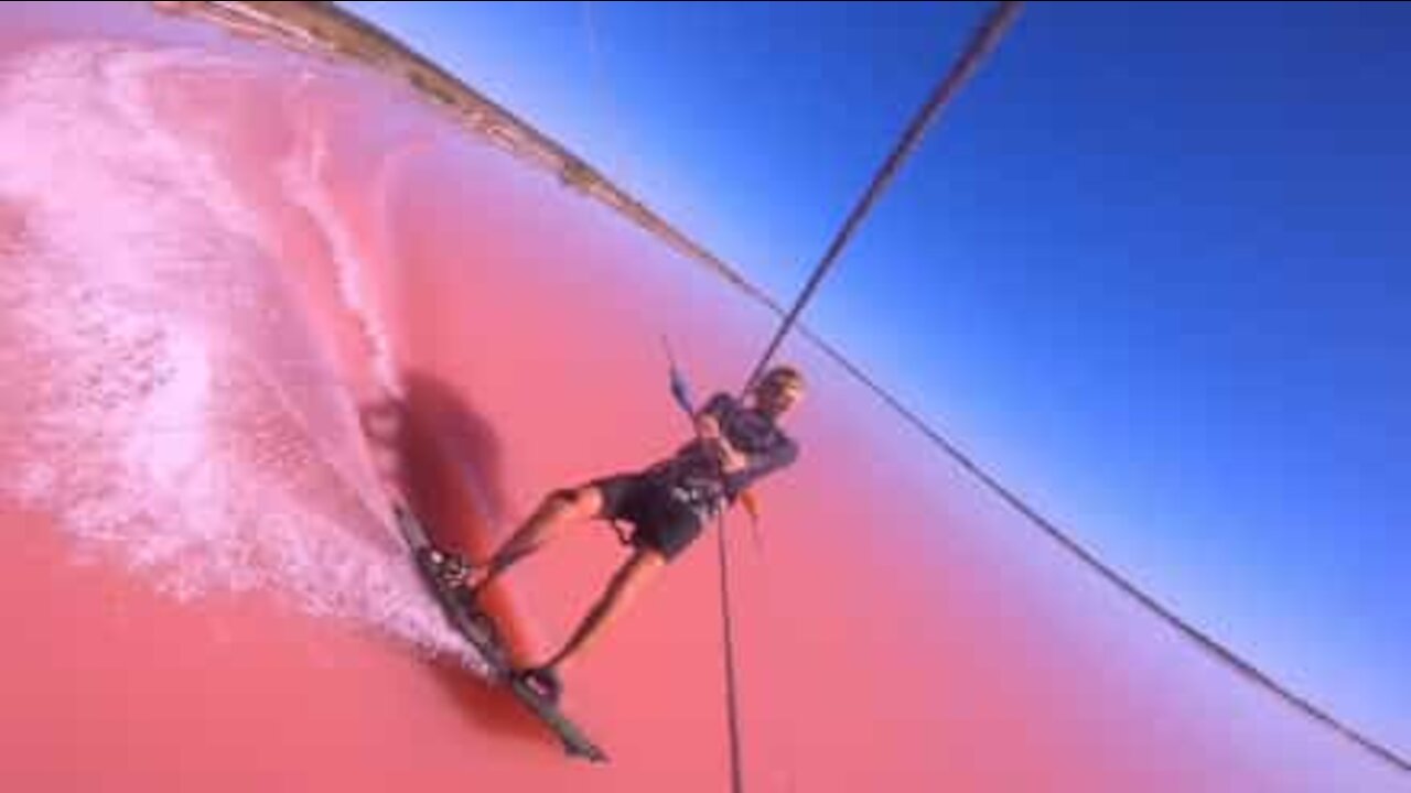 Kitesurfing on a pink lake!