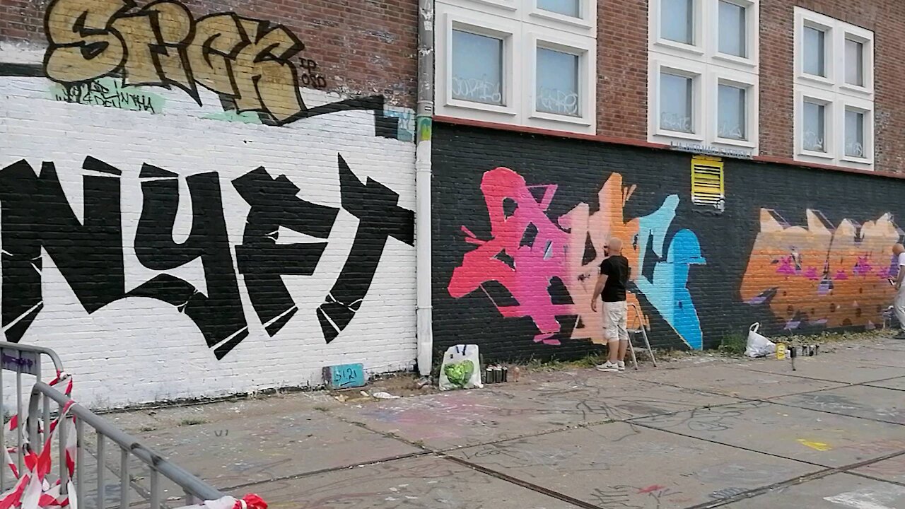 Graffiti artists at work