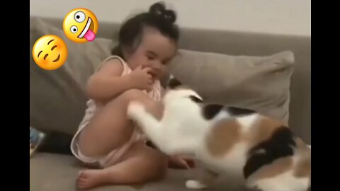 Love between baby and cat